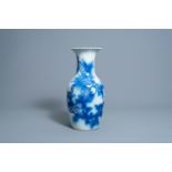 A Chinese blue and white 'dragons chasing the pearl' vase, 19th C.