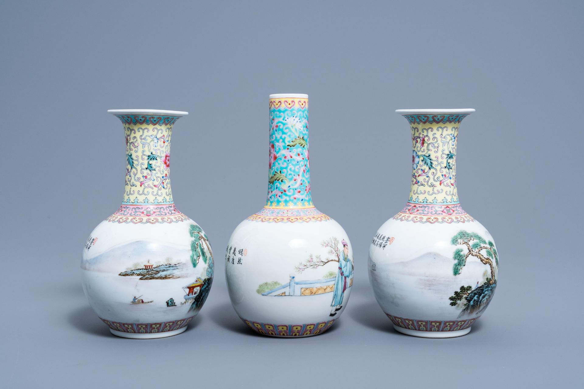 A pair of Chinese bottle shaped famille rose vases with an animated landscape and a vase with figura - Bild 4 aus 6