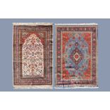 Two Oriental rugs with floral design, a.o. a Sarouk rug, wool on cotton, 20th C.
