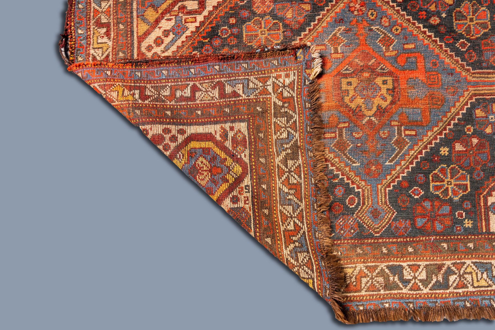 A Caucasian rug with geometric patterns and floral design, wool on cotton, 19th C. - Image 3 of 3