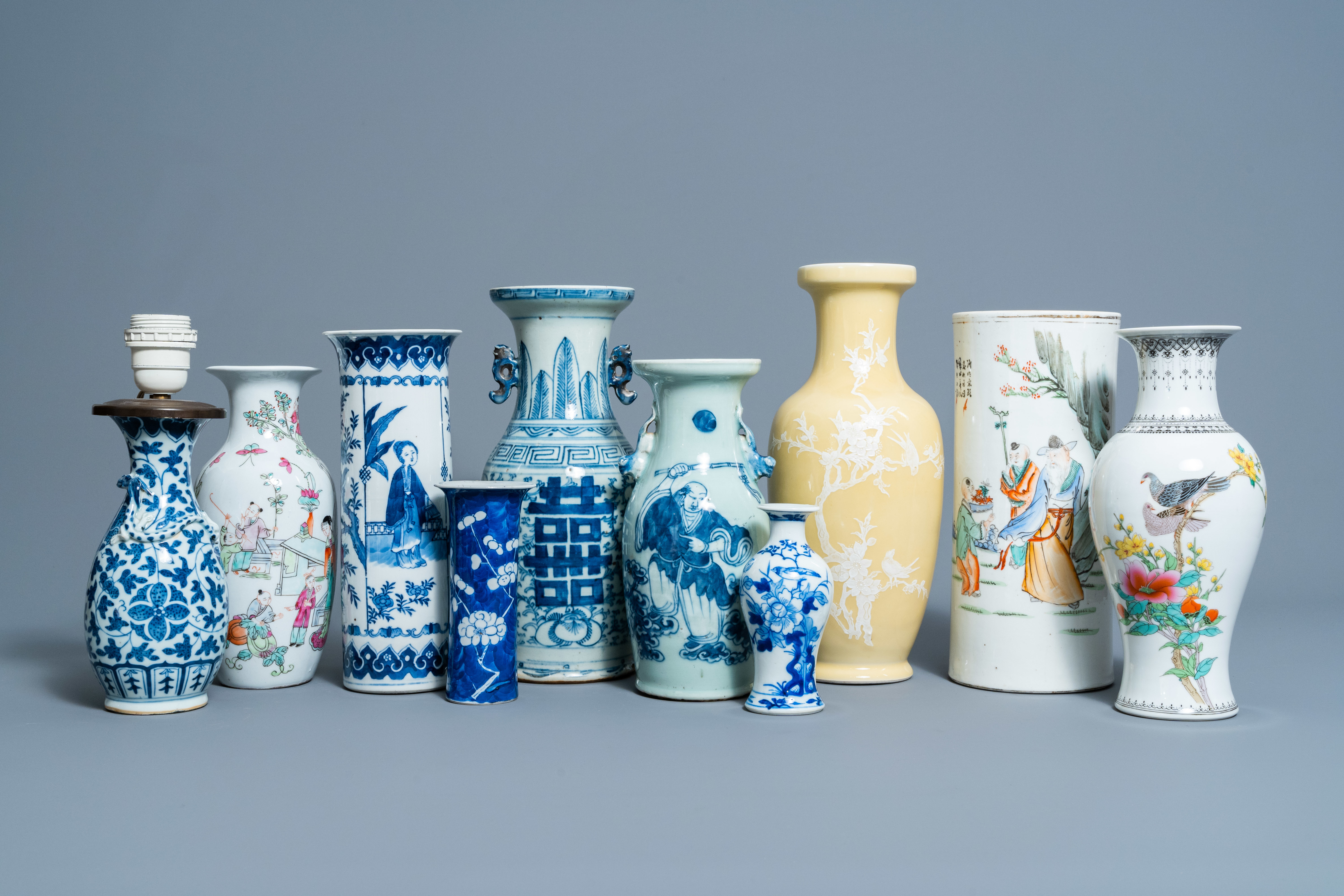 A varied collection of Chinese blue, white, famille rose and polychrome porcelain vases, 19th/20th C