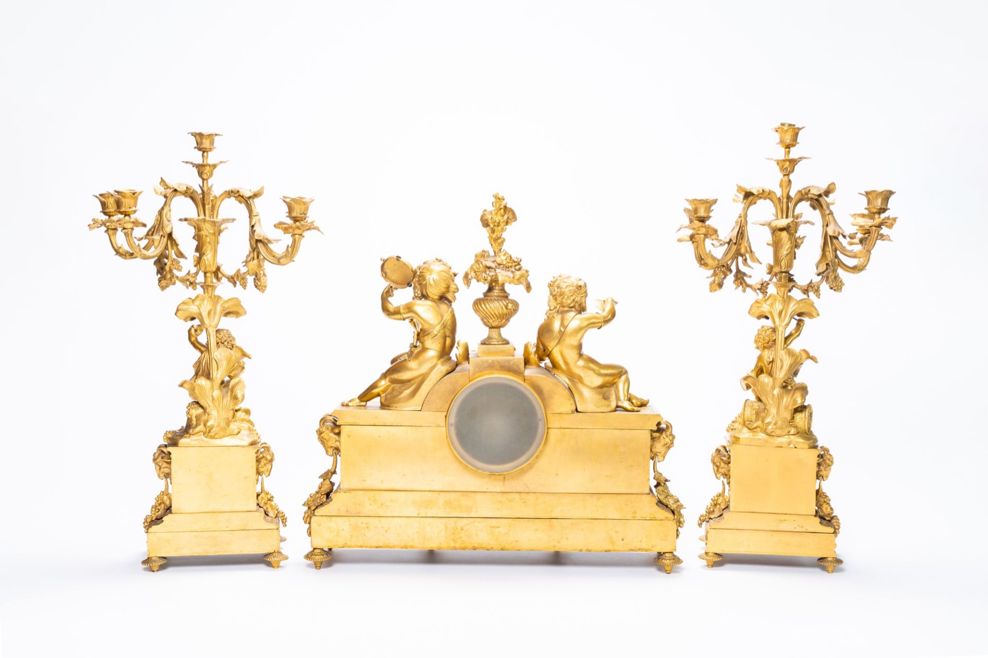 A French gilt bronze three-piece clock garniture with musicians and Svres style plaques, 19th C. - Image 3 of 21