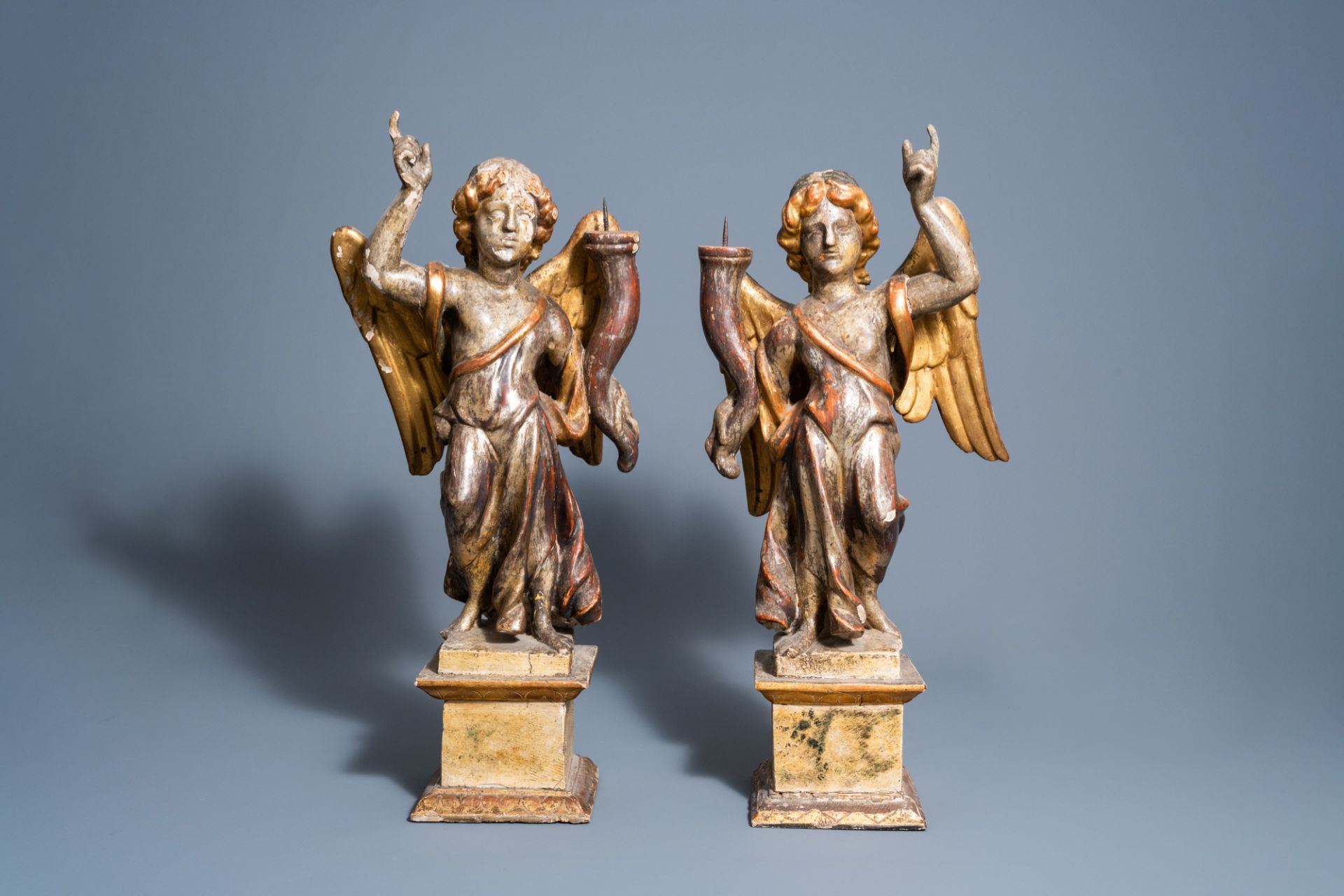 A pair of Italian carved, polychrome painted and gilt wooden angel shaped candlesticks, 18th C. - Image 3 of 9
