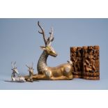 Three Indian brass and silver-plated metal models of deer and a pair of wood panels with dancers, 20