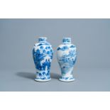 Two Chinese blue and white baluster shaped vases with an animated mountain landscape all around, Kan