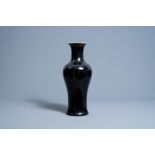 A Chinese monochrome black vase, Kangxi mark, 19th C.