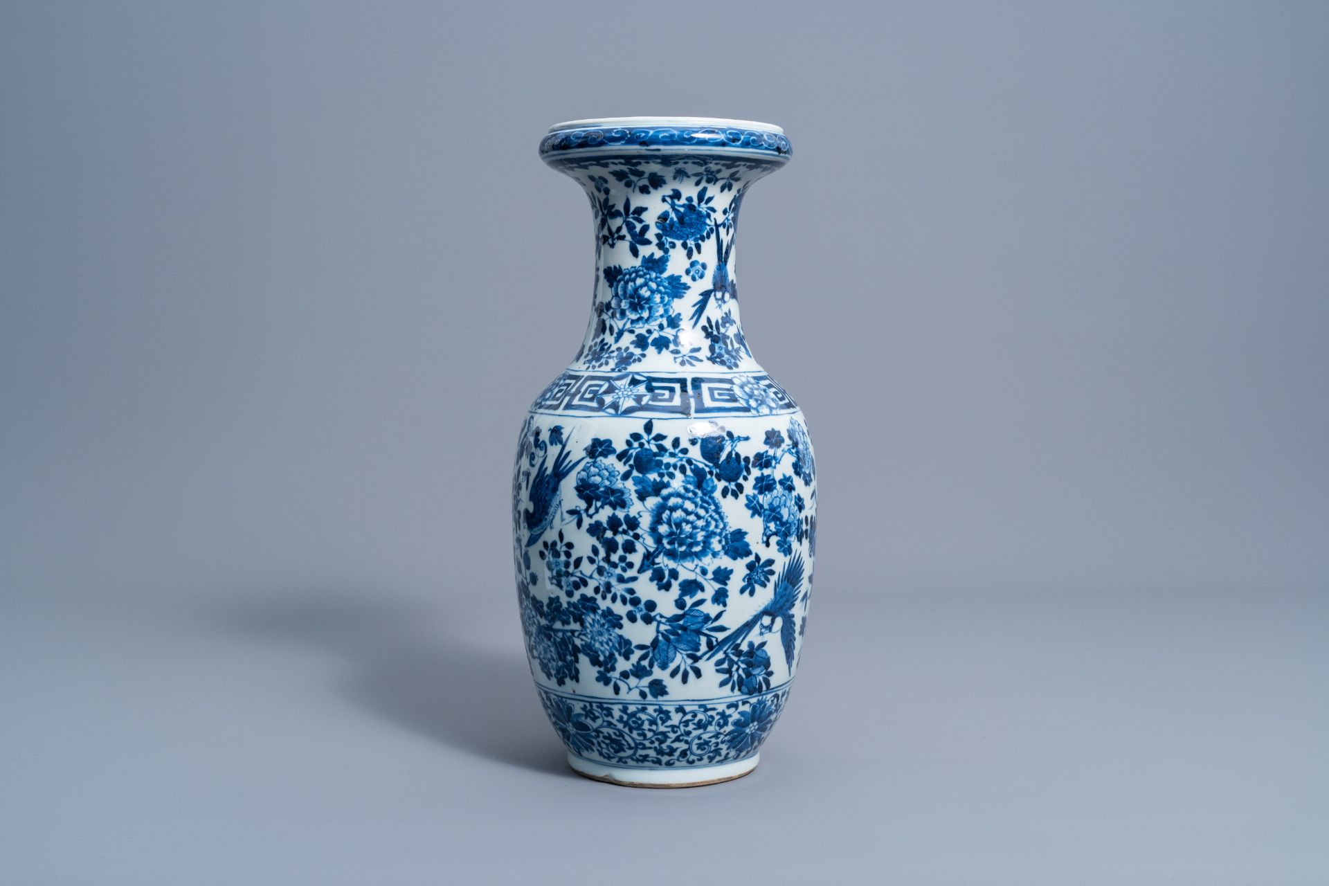 A Chinese blue and white vase with birds among blossoming branches, 19th C. - Image 4 of 6