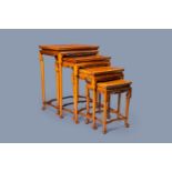 Four Chinese rectangular wood gigogne side tables, 20th C.