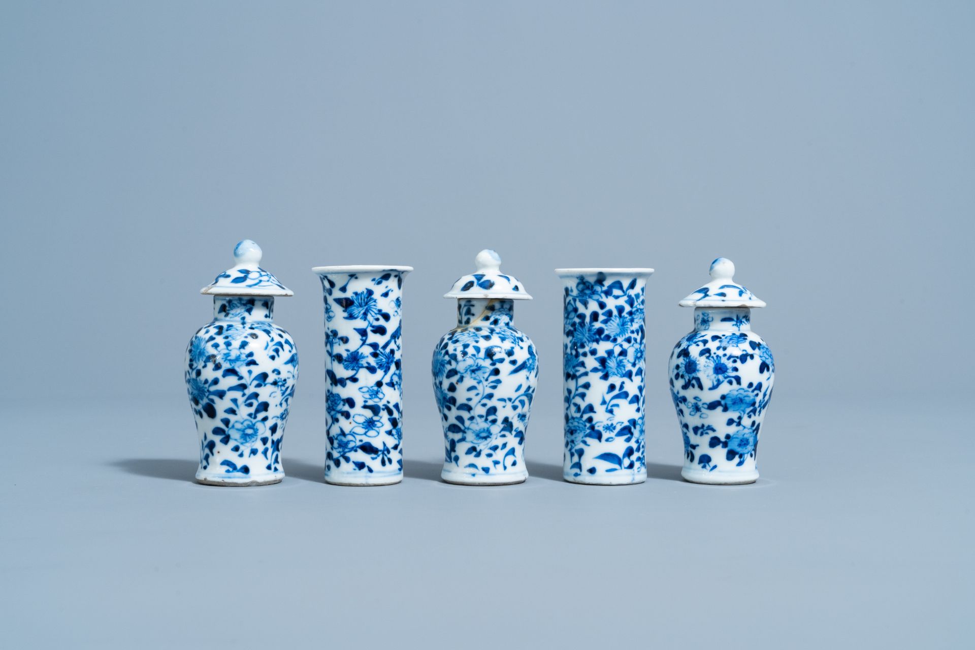 A Chinese blue and white five-piece garniture with floral design, 19th C. - Image 4 of 6