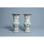 A pair of Chinese famille rose 'antiquities' yenyen vases, 19th C.