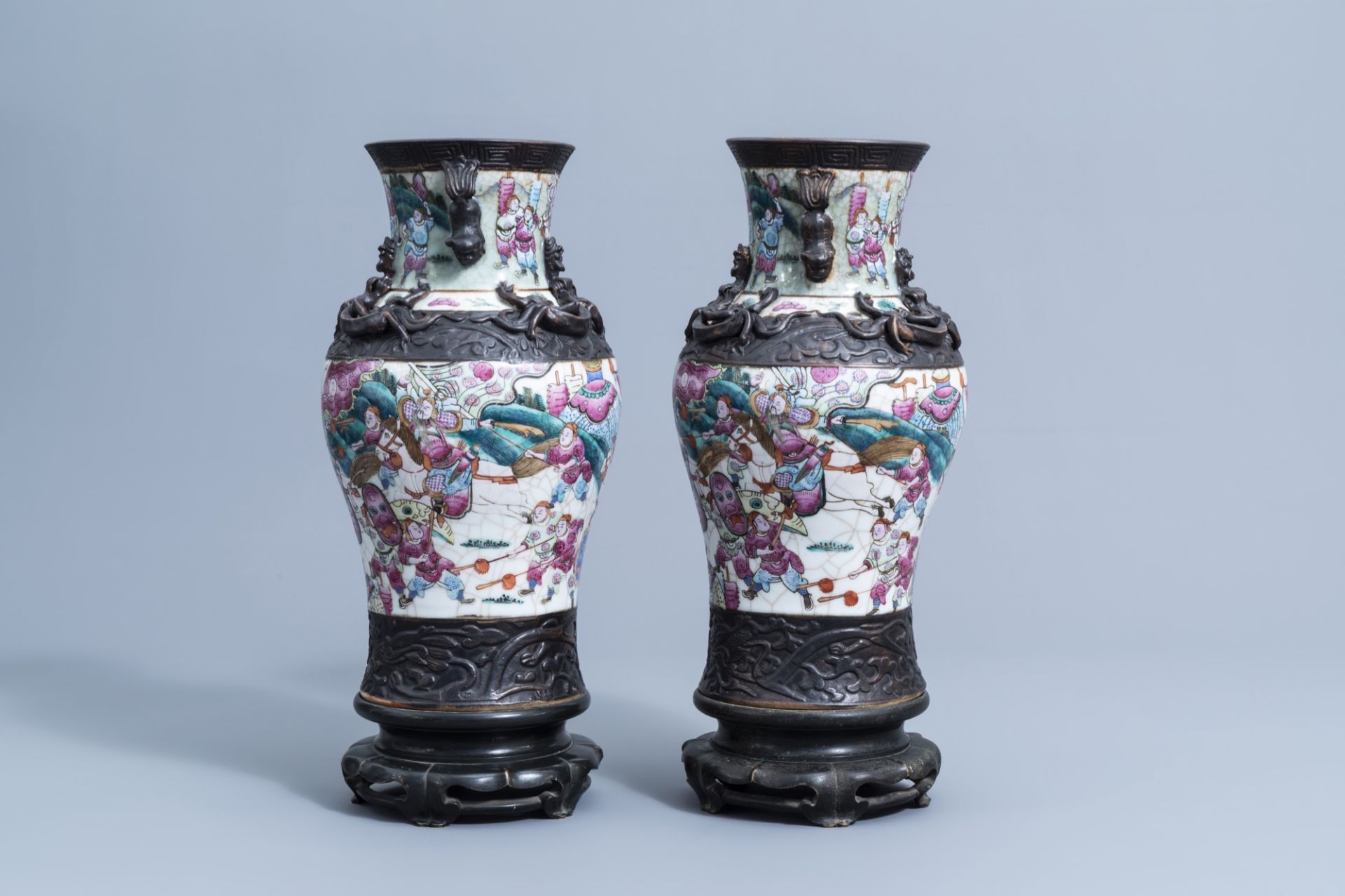 A pair of Chinese Nanking crackle glazed famille rose vases with warrior scenes on bronze lotus shap - Image 4 of 11