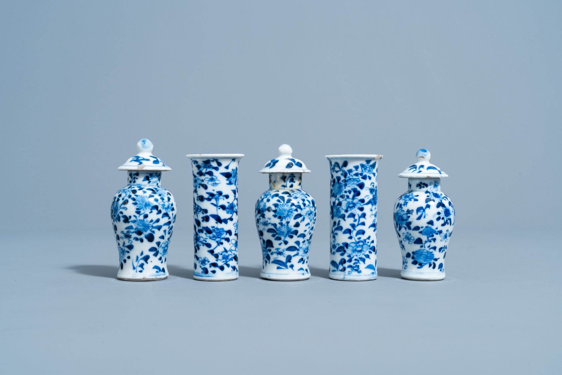 A Chinese blue and white five-piece garniture with floral design, 19th C. - Image 3 of 6