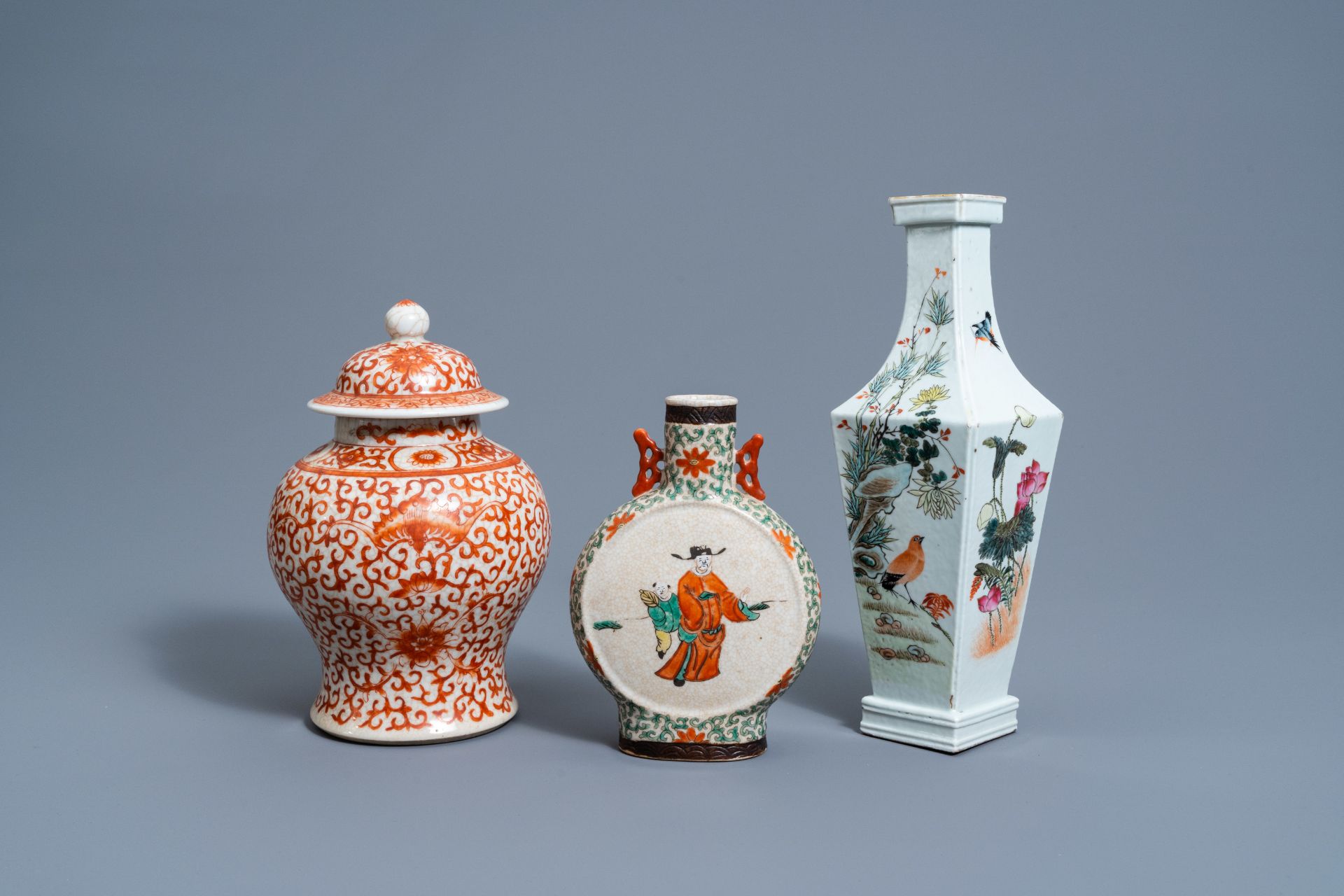 A Chinese square famille rose vase, an iron-red vase and cover and a Nanking crackle glazed famille