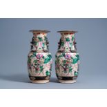 A pair of Chinese Nanking crackle glazed famille rose vases with warrior scenes, 19th C.