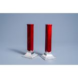 A pair of English red glazed solifleur vases with silver bases, George Betjemann & Sons mark, London