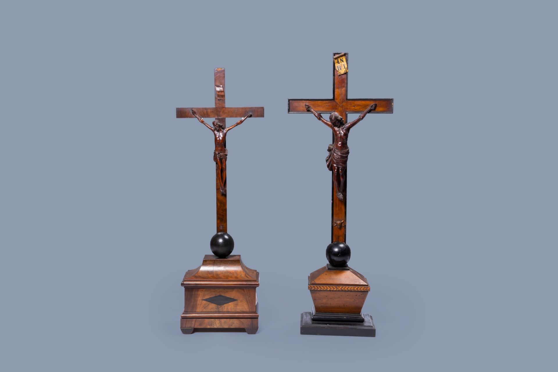 Two large inlaid wooden crucifixes with carved Corpus Christi, France or Flanders, 18th/19th C.