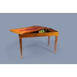 A French mahogany trictrac game table with leather top, 18th/19th C.