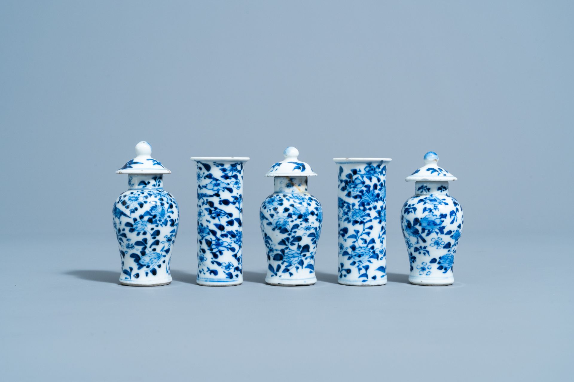 A Chinese blue and white five-piece garniture with floral design, 19th C. - Image 2 of 6