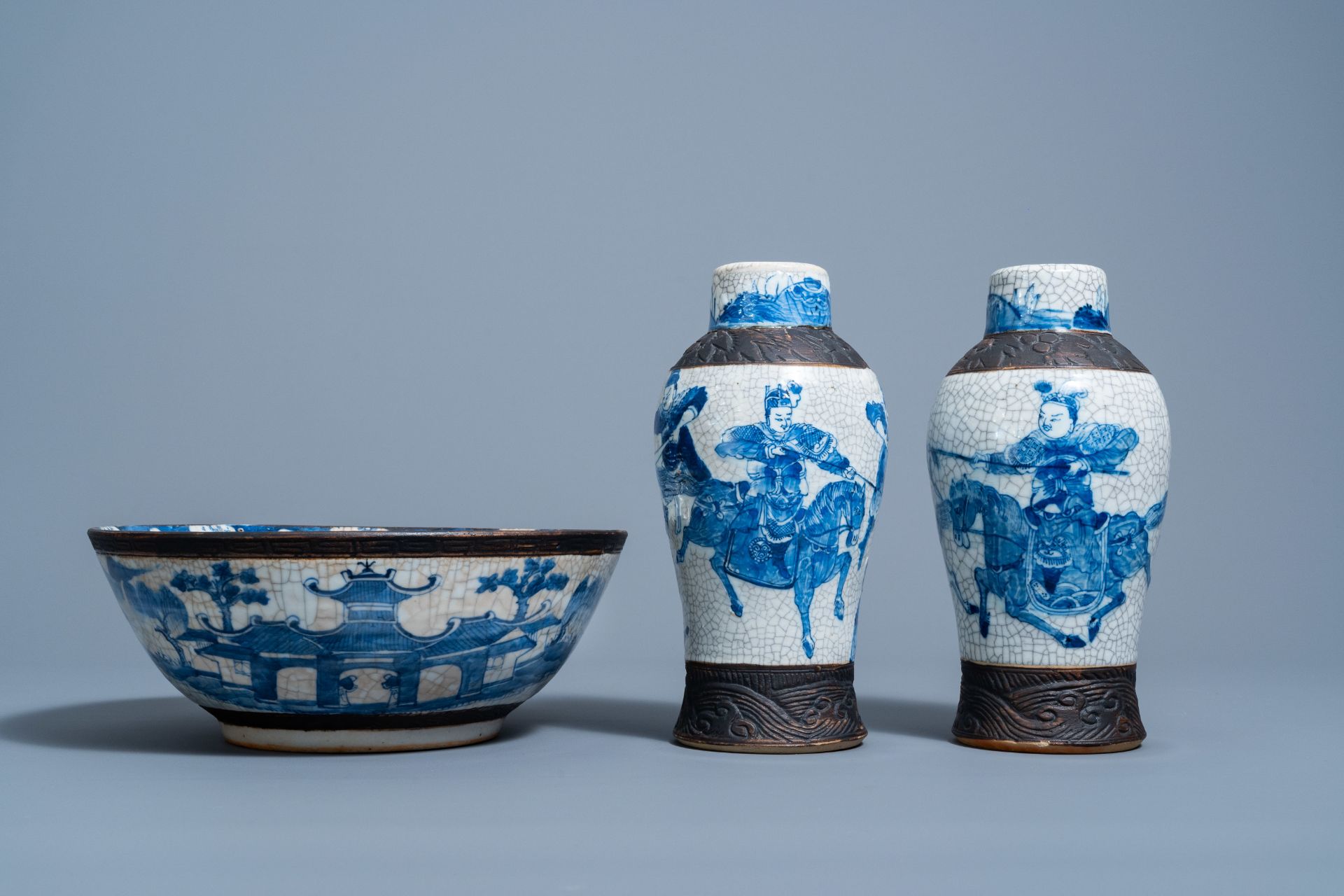 Two Chinese Nanking crackle glazed blue and white 'warrior' vases and a 'landscape' bowl, 19th/20th - Image 2 of 7