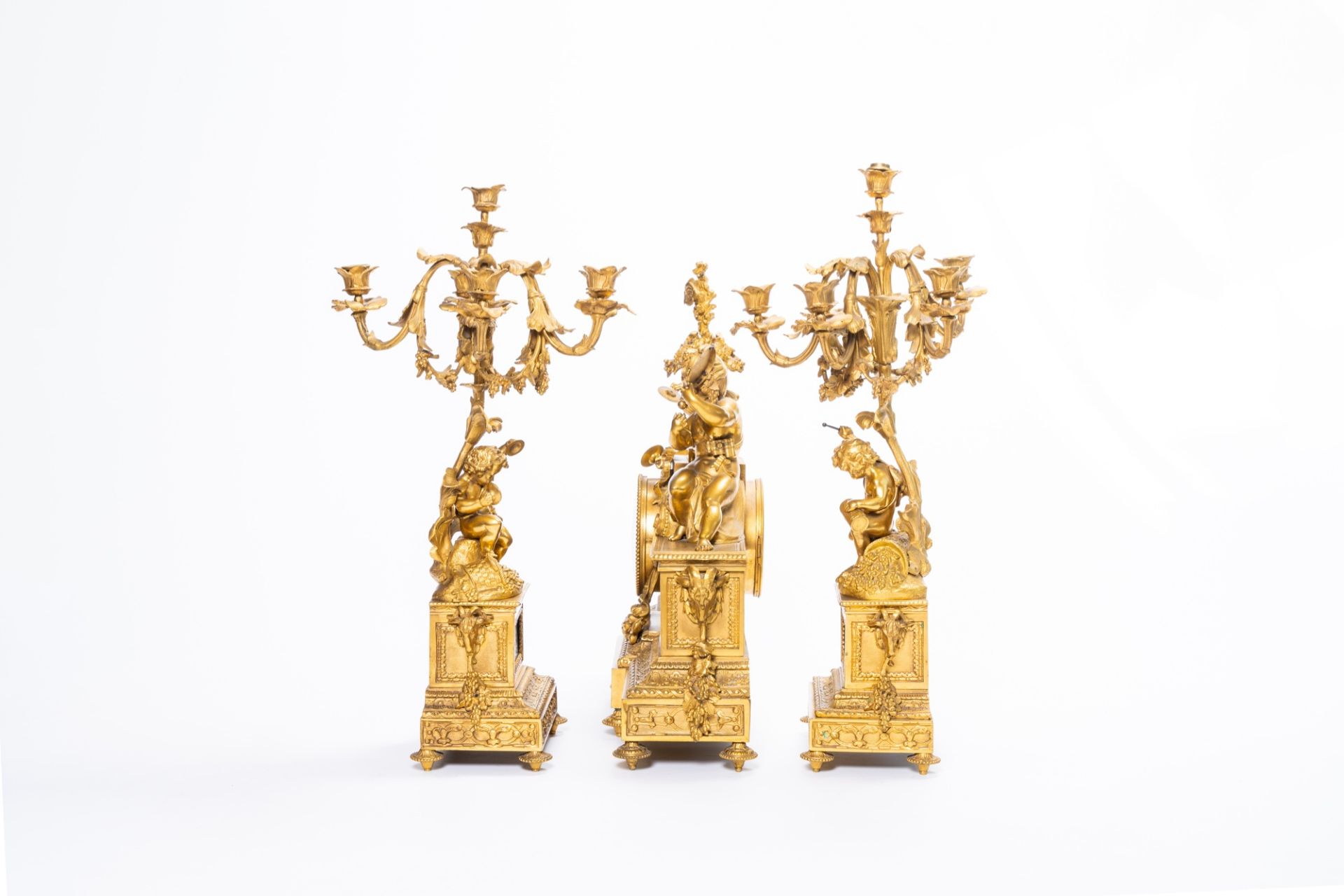 A French gilt bronze three-piece clock garniture with musicians and Svres style plaques, 19th C. - Image 5 of 21