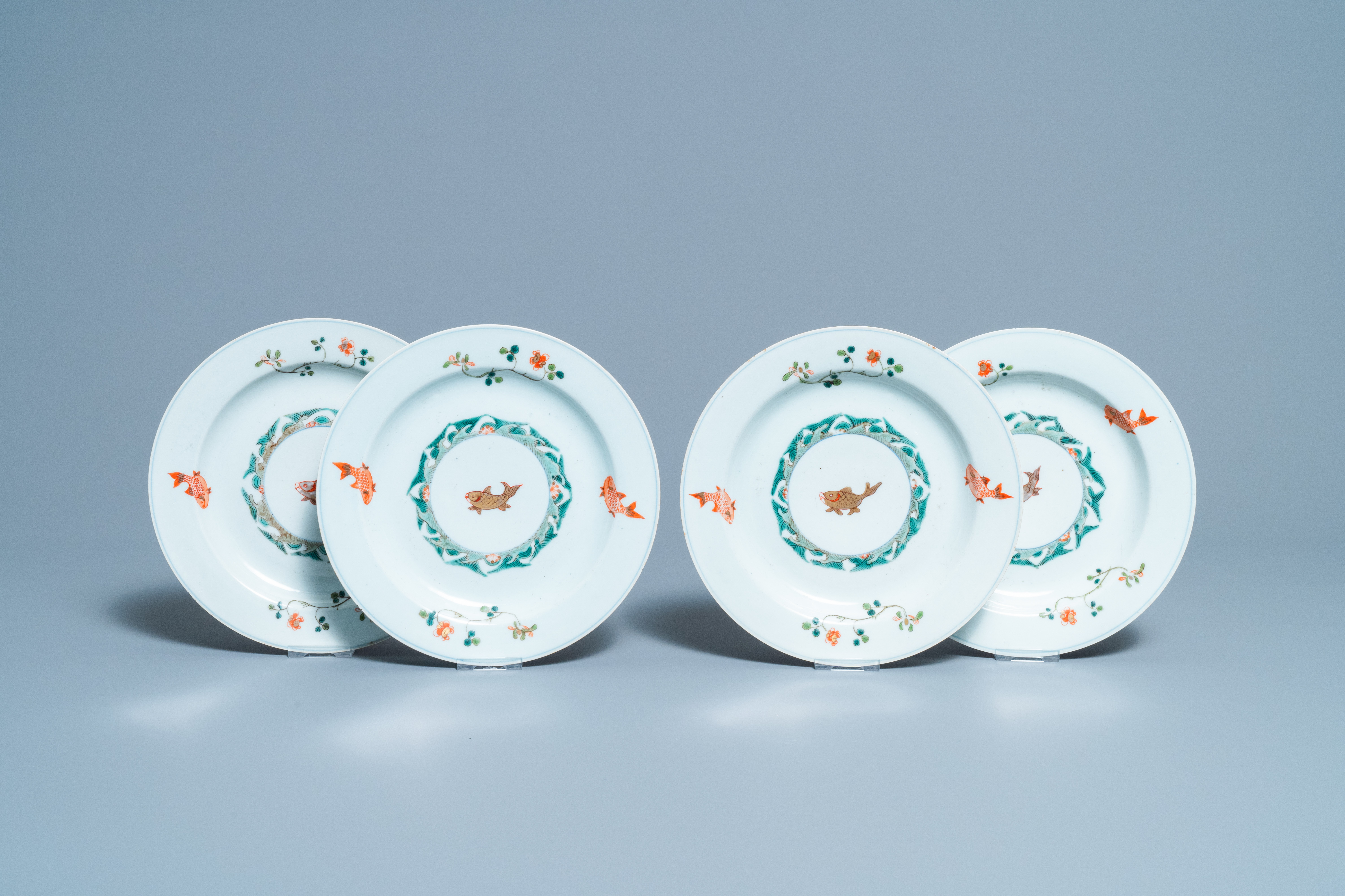 Four Chinese famille verte 'fish' plates, 20th C.