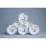 Seven Chinese Imari style plates with ducks in a river landscape and floral design, Qianlong