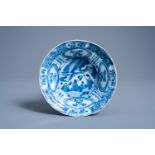 A Chinese blue and white kraak porcelain klapmuts bowl with figures in a landscape, Wanli