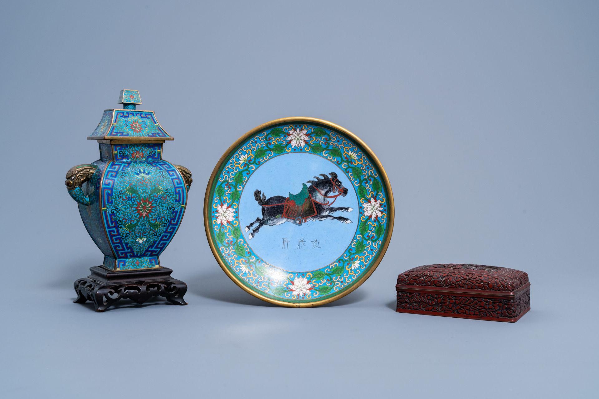 A Chinese red lacquer box and cover with an animated landscape and a cloisonnŽ vase and cover and di