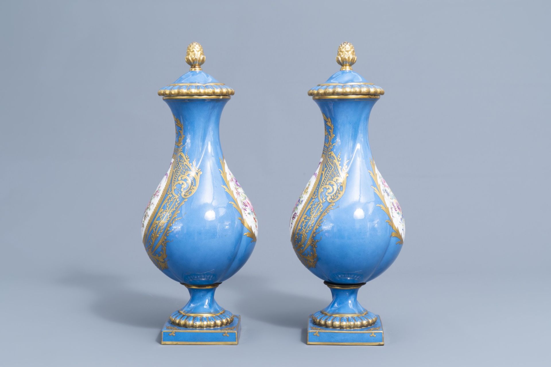 A pair of French gold layered 'bleu celeste' ground vases and covers in the Svres manner and an Emp - Image 5 of 14