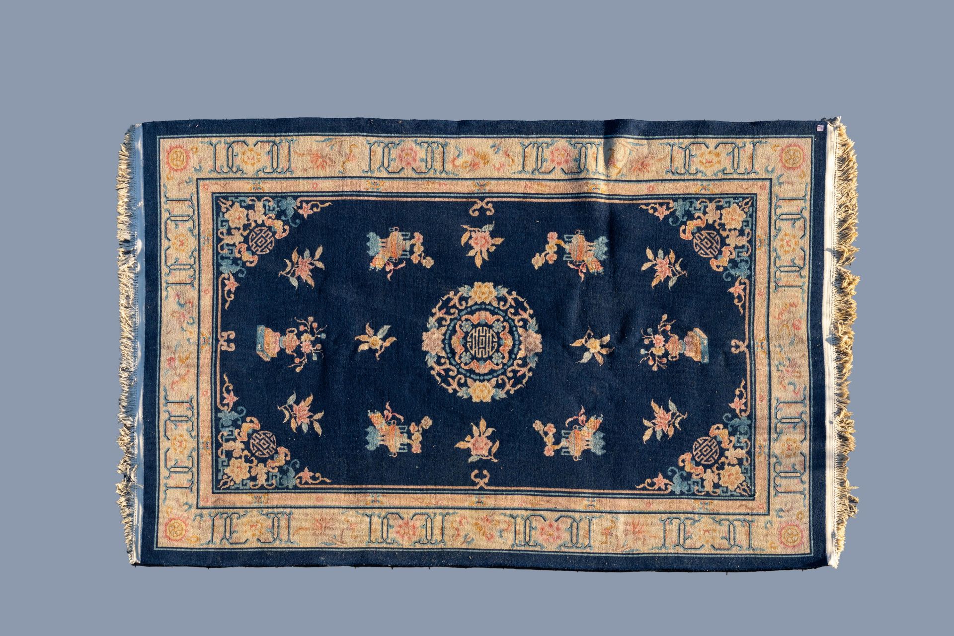 Two Chinese woolen 'Beijing' carpets with antiquities design, 20th C. - Image 7 of 7