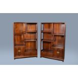 A pair of Chinese wooden display cabinets, 20th C.