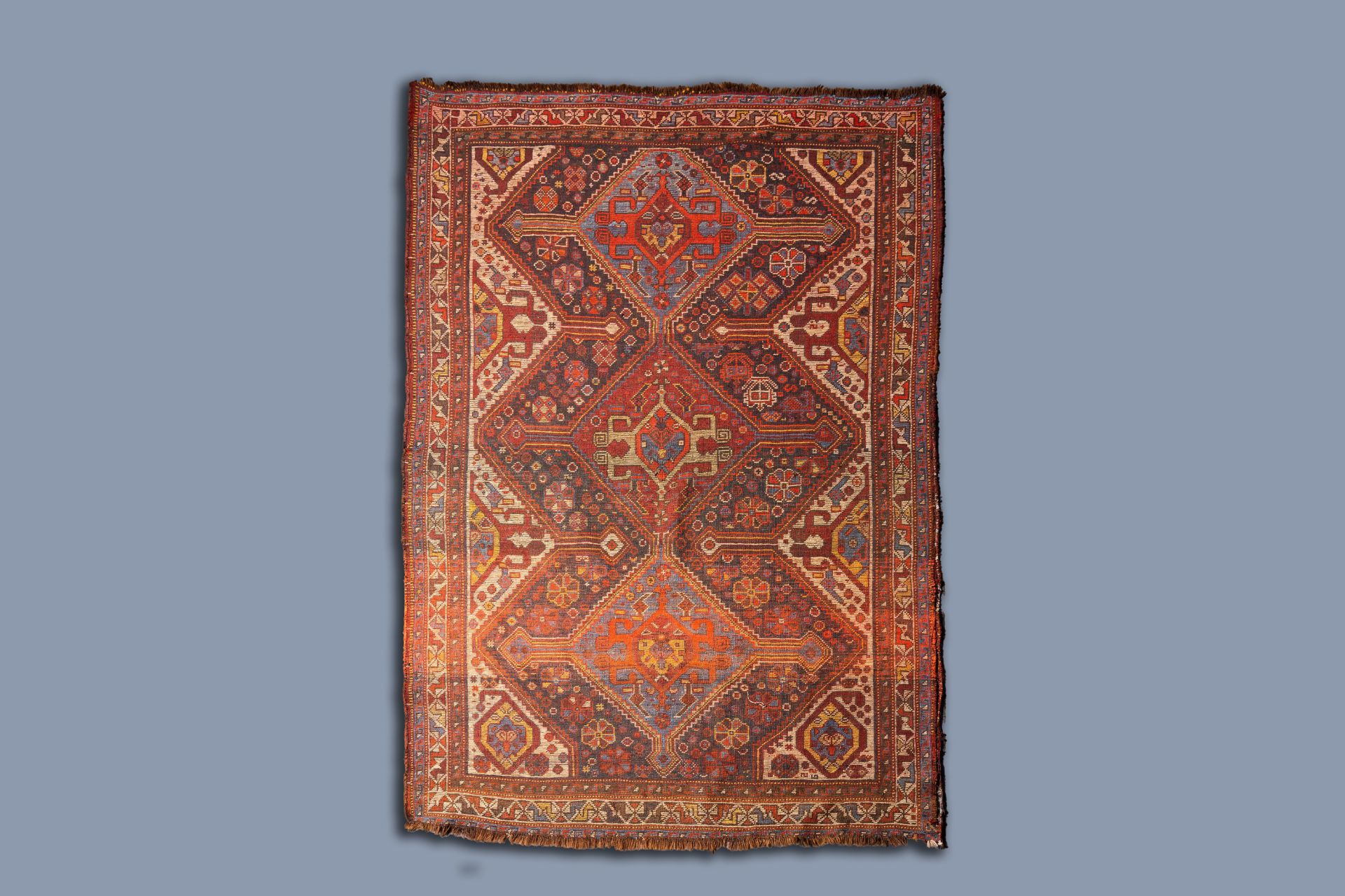 A Caucasian rug with geometric patterns and floral design, wool on cotton, 19th C. - Image 2 of 3