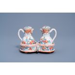 A polychrome Dutch Delft petit feu cruet set, 18th C.