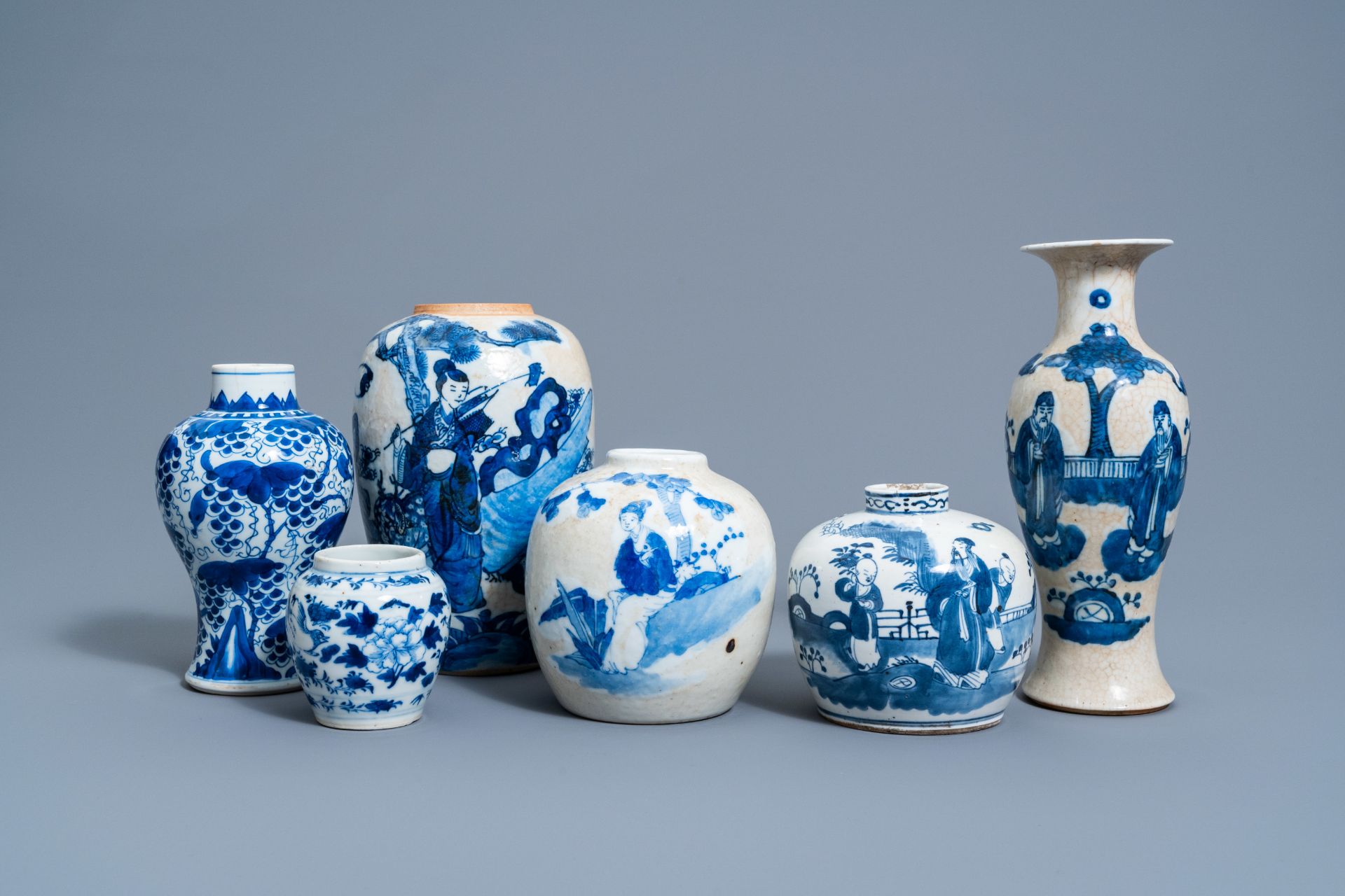 Six various Chinese blue and white vases and jars with figures in a landscape and floral design, 19t