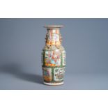 A Chinese Canton famille rose vase with palace scenes, 19th C.