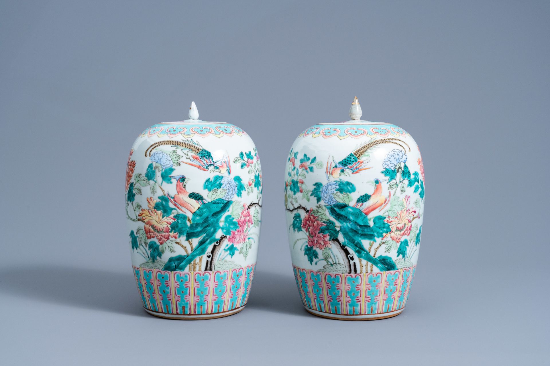 A pair of Chinese famille rose jars and covers with birds among blossoming branches, 19th C. - Image 3 of 10