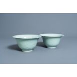 Two Chinese celadon bowls with underglaze design, Yongzheng mark, 20th C.