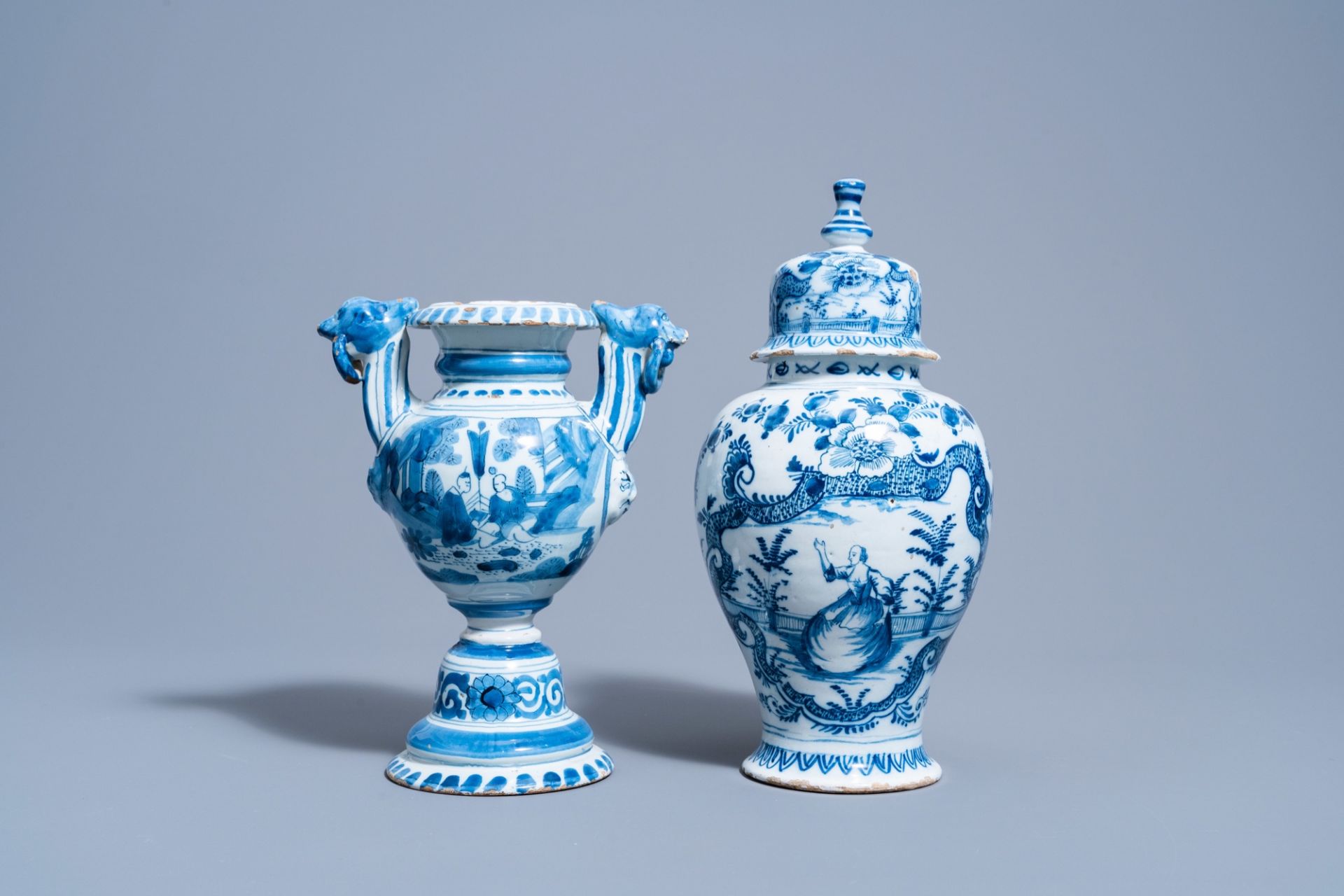A Dutch Delft blue and white gadrooned dish with a boat and two vases with figures in a garden, 17th - Image 4 of 9