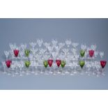 An extensive collection of clear and partly coloured overlay crystal cut glasses, 20th C.