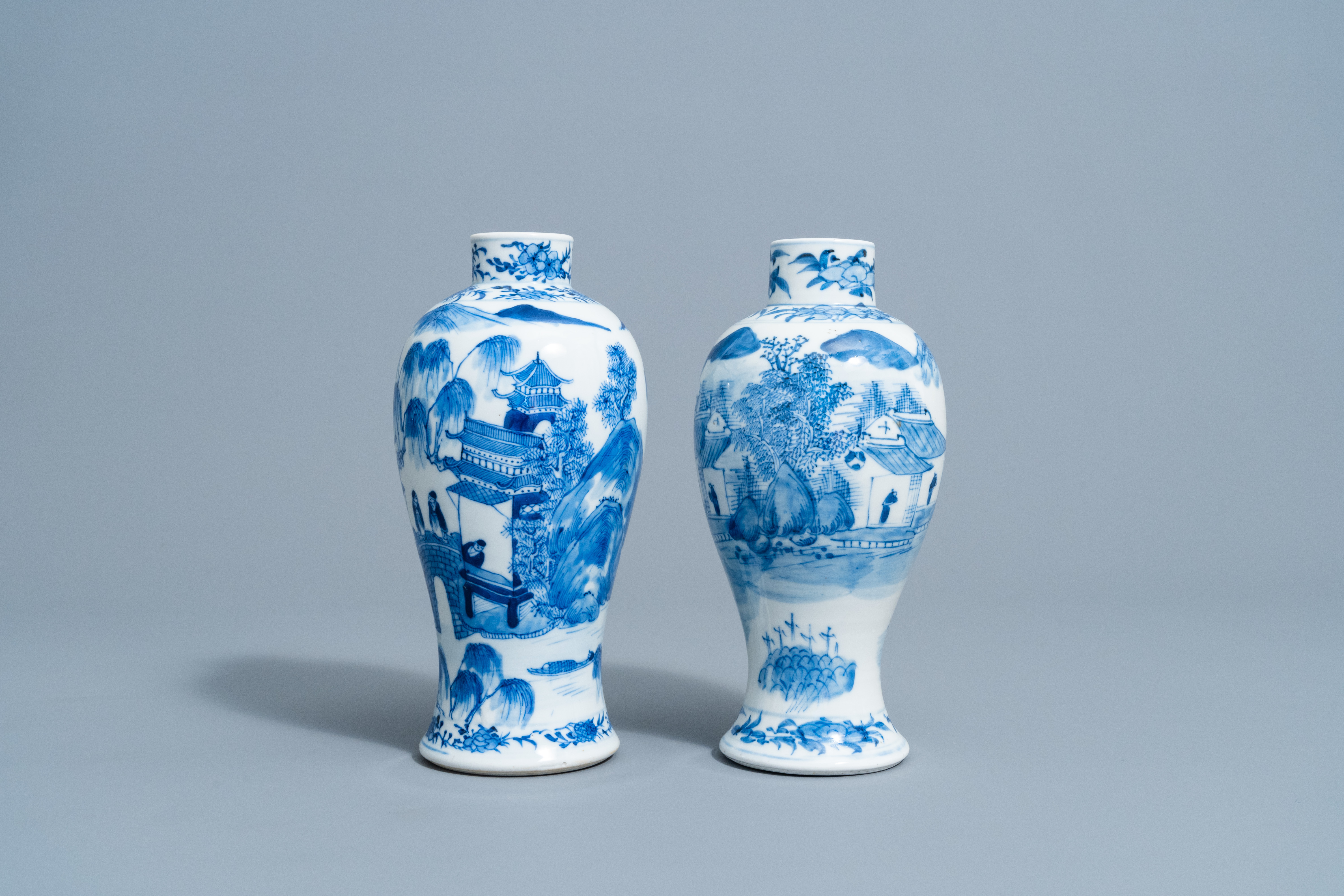 Two Chinese blue and white baluster shaped vases with an animated mountain landscape all around, Kan - Image 2 of 6