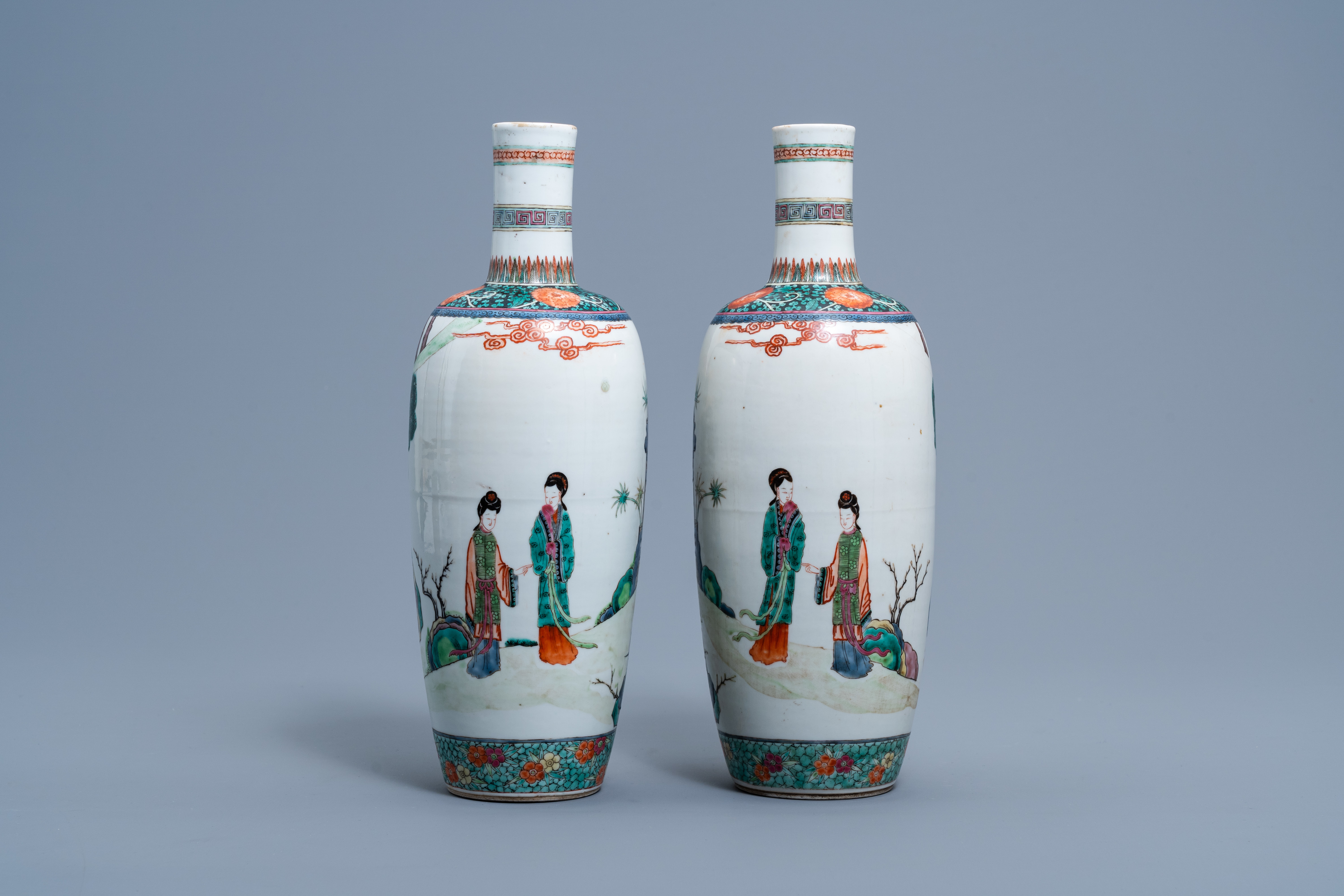 A pair of Chinese bottle shaped famille verte vases with figures in a landscape, 19th C. - Image 3 of 6