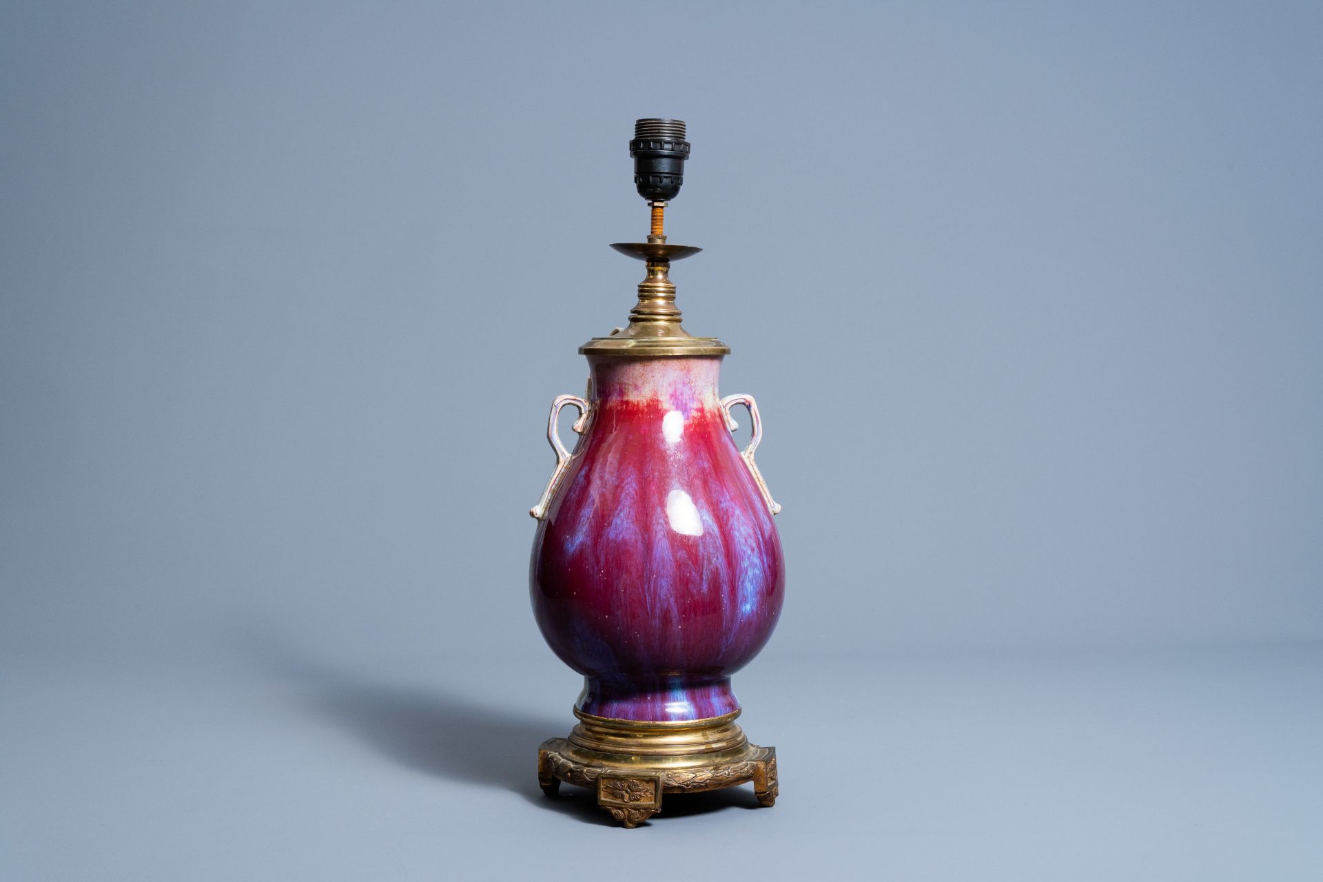 A Chinese flambŽ glazed 'hu' vase mounted as a lamp, Qianlong mark, 19th/20th C.