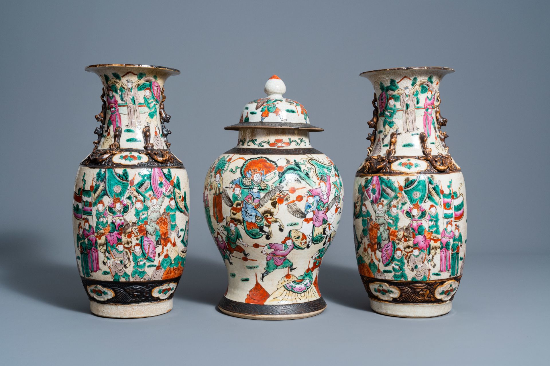 A pair of Chinese Nanking crackle glazed famille rose vases and a vase and cover with warrior scenes - Image 2 of 7