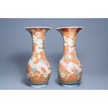 A pair of Japanese Imari trumpet vases with dragon relief design, Meiji, 19th/20th C.