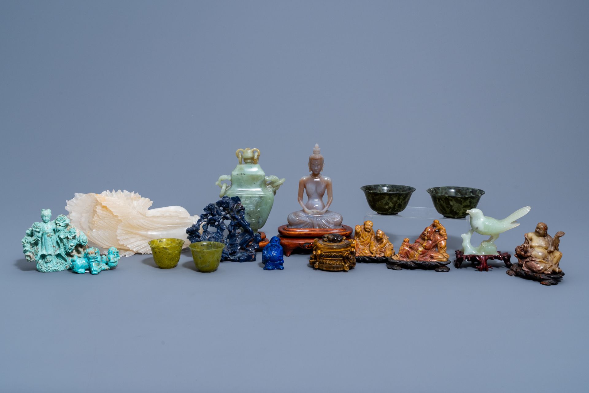 A varied collection of Chinese sculptures and objects in various precious stones, 20th C.