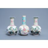 A pair of Chinese bottle shaped famille rose vases with an animated landscape and a vase with figura