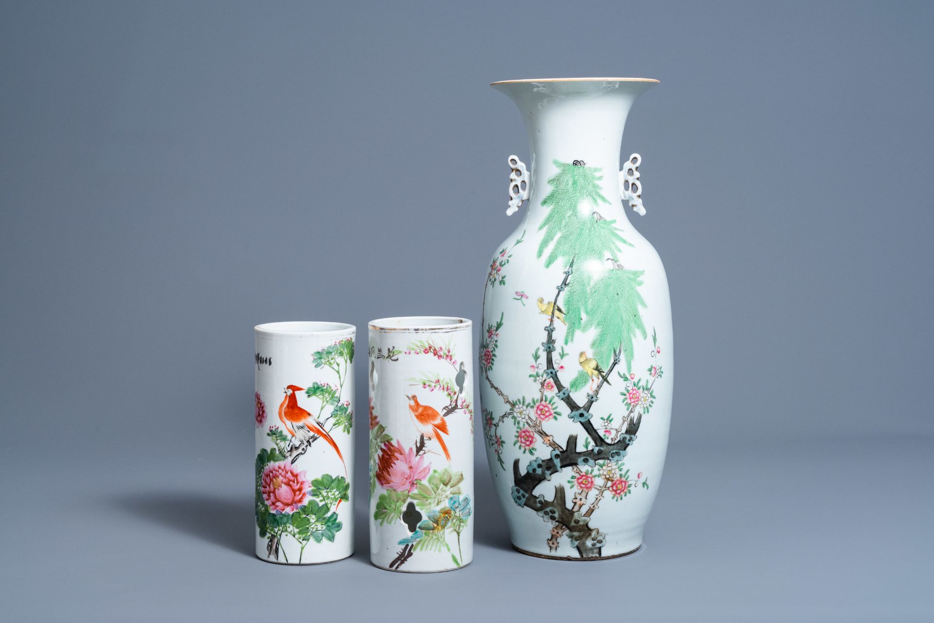 Two Chinese qianjiang cai hat stands and a vase with birds among blossoming branches, 19th/20th C.