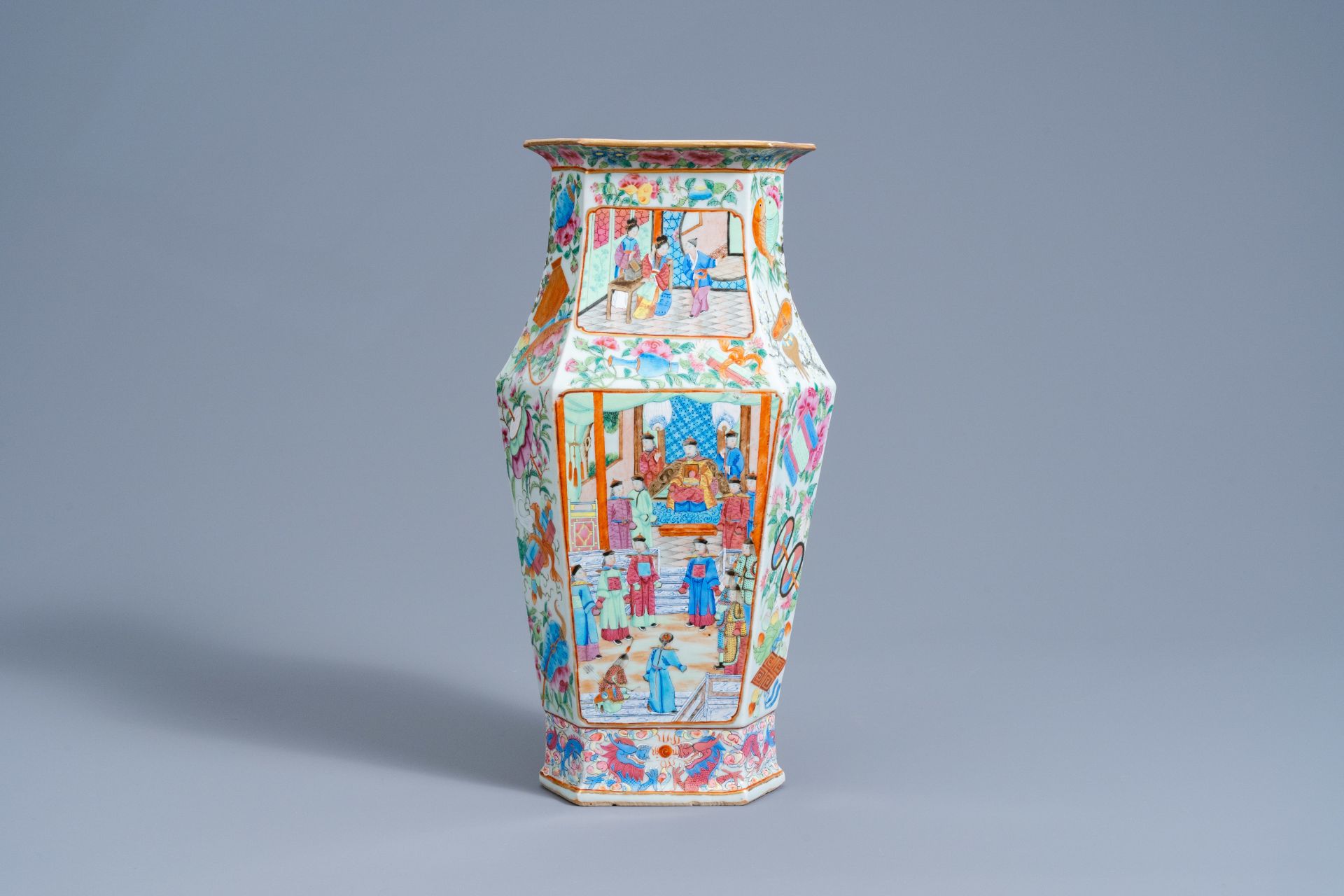 A hexagonal Chinese Canton famille rose vase with palace scenes, 19th C.