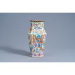 A hexagonal Chinese Canton famille rose vase with palace scenes, 19th C.