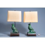 A pair of Chinese bird-shaped roof tiles mounted as lamps, 19th/20th C.